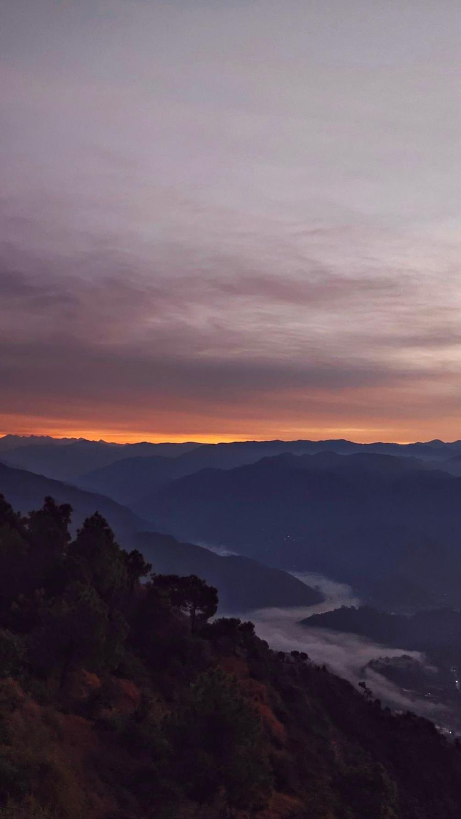 Mauve twilight with valley mist